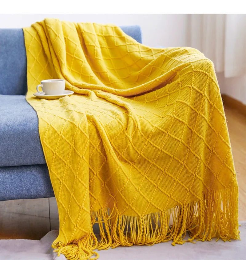 Jeté décoratif en maille texturée avec franges