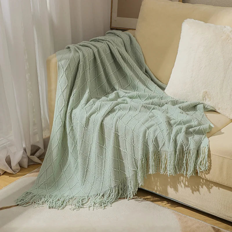 Jeté décoratif en maille texturée avec franges