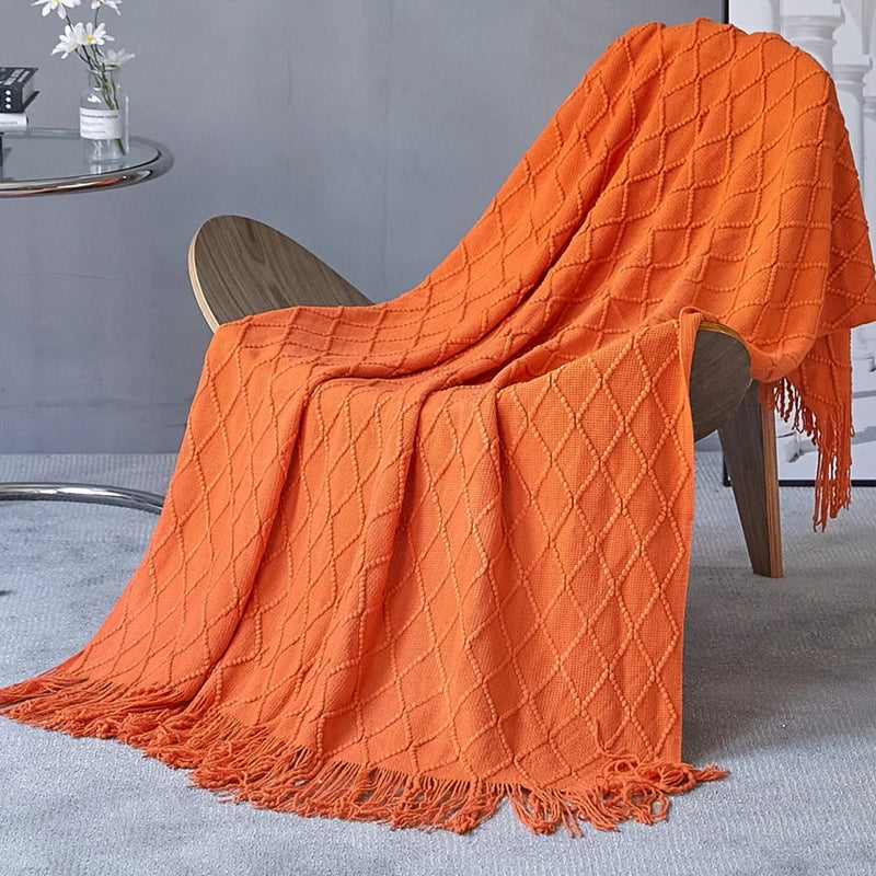 Jeté décoratif en maille texturée avec franges
