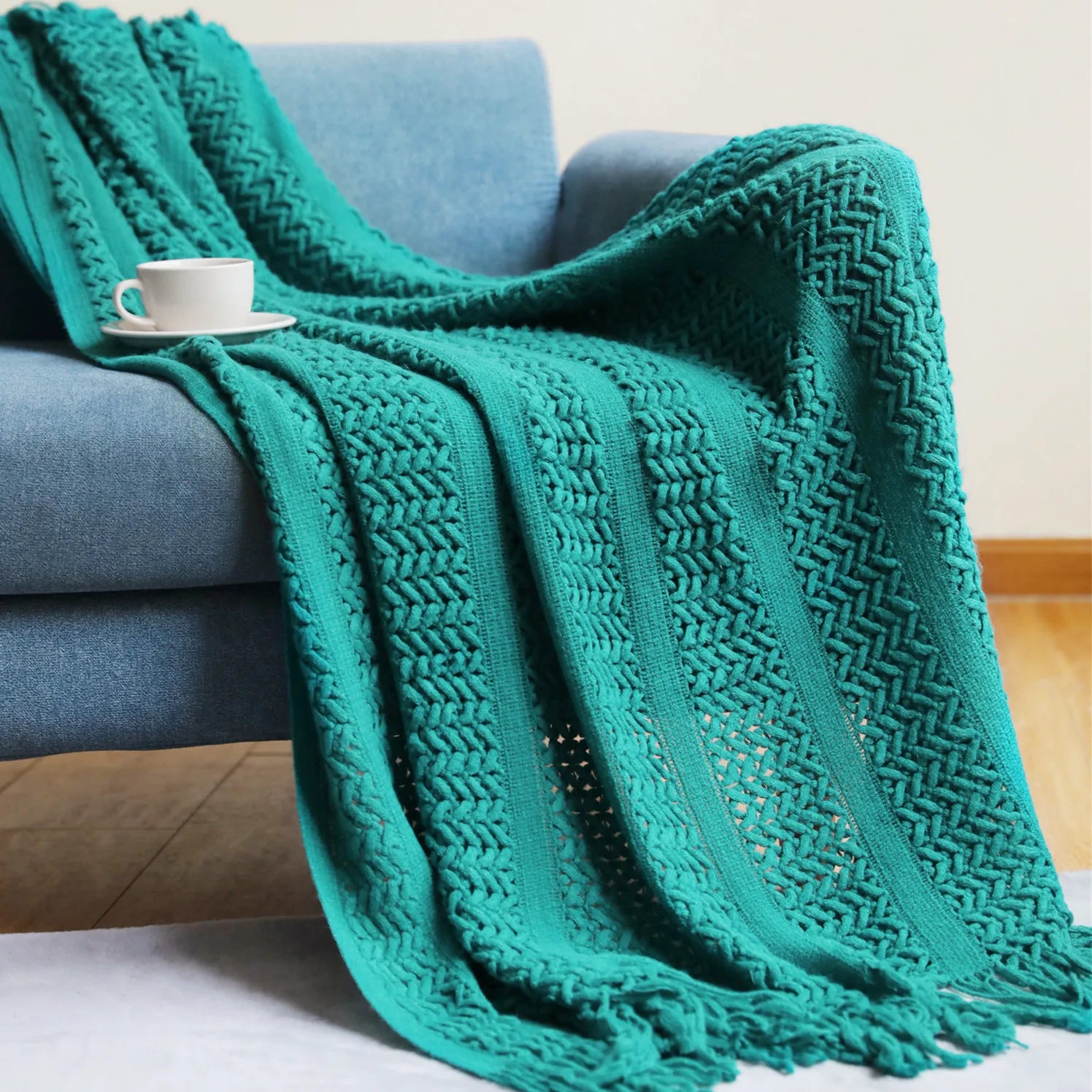 Jeté décoratif en maille texturée avec franges