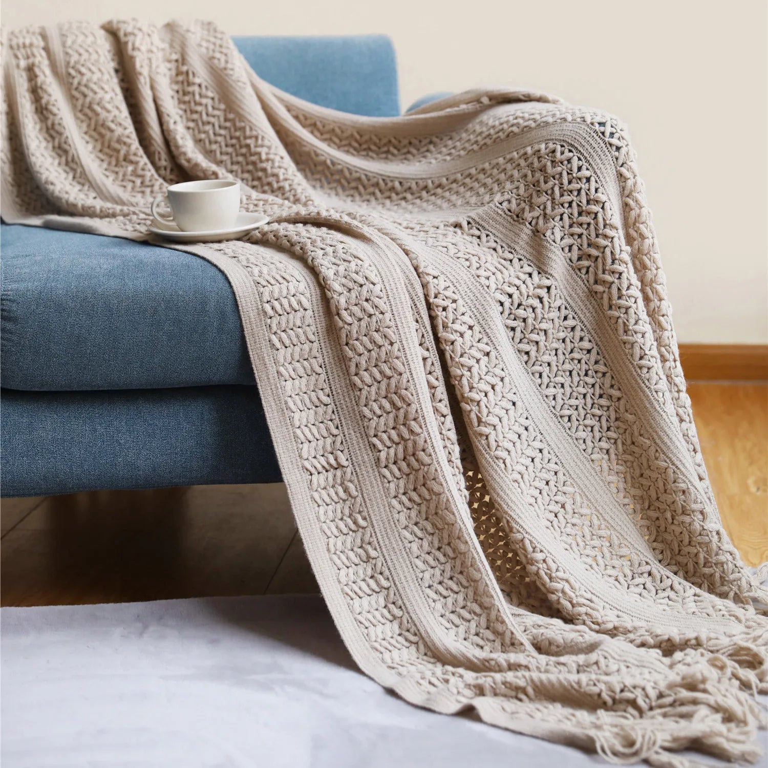 Jeté décoratif en maille texturée avec franges