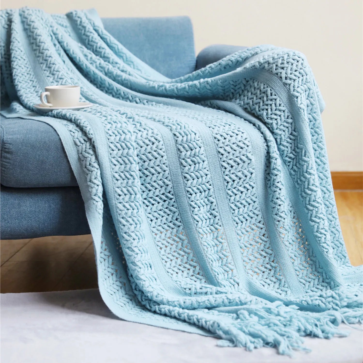 Jeté décoratif en maille texturée avec franges
