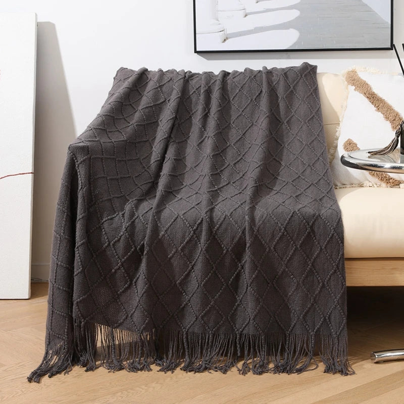 Jeté décoratif en maille texturée avec franges